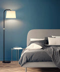 Sturdy Metal Arc Floor Lamp With Two Shade Options, 9W LED Bulb, 3 Color Temperatures, Long Power Cord in modern bedroom.