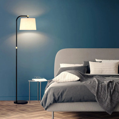 Sturdy Metal Arc Floor Lamp With Two Shade Options, 9W LED Bulb, 3 Color Temperatures, Long Power Cord in modern bedroom.