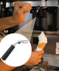 Adjustable Ice Cream Discharge Lever Handle for Soft Serve Machines in use dispensing ice cream cone, inset detail of replacement part