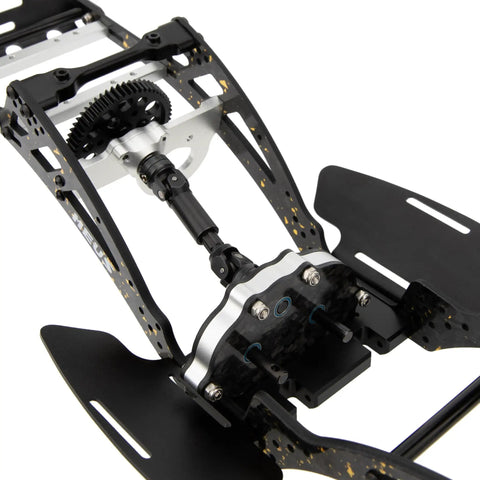 Close-up of Gold Rush V2 Carbon Fiber LCG Chassis Kit For Axial SCX10 II Capra 1.9 UTB showing carbon fiber construction and gears