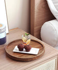 Acacia Wood Lazy Susan Turntable Organizer for Kitchen Cabinets and Pantry Rotating Spice Rack on table with muffins and drink