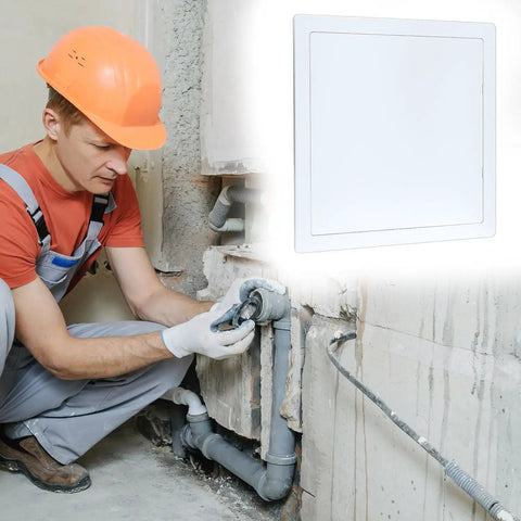 Worker using a Crush Proof 12X12 Inch Abs Plastic Drywall Access Panel for plumbing access in construction.