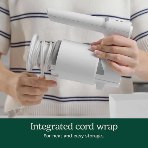 Lightweight Nine Speed Electric Hand Mixer With Grippy Ergonomic Handle And One Touch Digital Controls showing integrated cord wrap for storage.