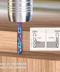 Compression router bit with blue twisted flutes cutting into wood; tungsten carbide end mill.