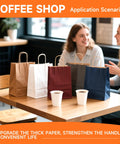 Kraft Paper Gift Bags With Handles Bulk Pack 100, 8x4.5x10.8 Inch Recyclable, shown on café table with two women