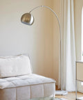 Tall Arc Floor Lamp With Marble Base In Brushed Nickel LED Bulb Included Adjustable Height 59 To 69 Inches 360 Rotating Shade Dope Modern Lighting For Living Room Perfect For Sofa And Reading Nook next to sofa.