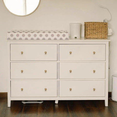 White dresser with Champagne Bronze Cabinet Knob Set, 12 Pack Round Ball Knobs For Kitchen Cabinets And Drawers, 0.85 Inch Diameter, Zinc Alloy Construction, Rust Resistant, Durable And Easy To Install.