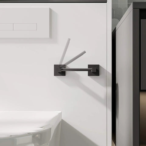 Matte Black Double Post Pivoting Toilet Paper Holder Wall Mount Modern Square Roll Holder in a compact bathroom setting.