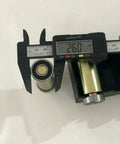 Badass 2x72 Belt Grinder Small Wheel Kit For Knife Makers And Bladesmiths measuring steel cylinder with a caliper at 26mm.