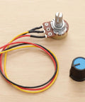 10K Linear Taper Rotary Potentiometer Pack With Knurled Shaft 3 Terminals Prewired XH2.54 cable and knob cap on table