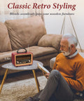 Retro Bluetooth Speaker With Deep Bass And Stereo Sound Portable AM FM Radio on coffee table near man reading in living room