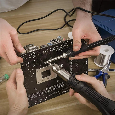Hands using 2 In 1 Soldering And Hot Air Rework Station With 750W Power on a PCB, showing precise 212 F To 896 F temperature control.