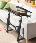 Small Standing Desk On Wheels For Treadmill Workouts, Portable Rolling Desk with Adjustable Height for laptop use, beside a sofa