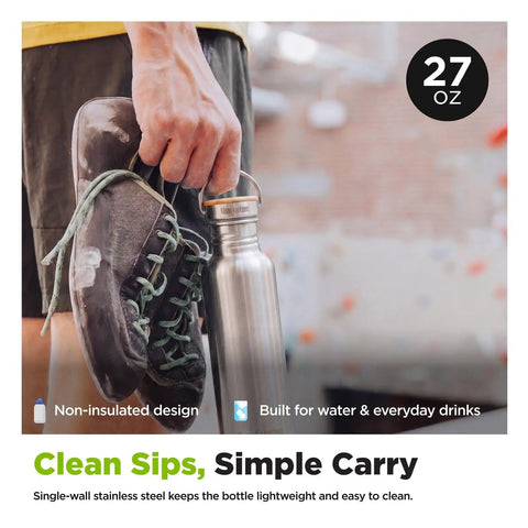 27 Oz Brushed Stainless Steel Water Bottle With Bamboo Lid Leak Proof Reusable Drinkware held by a person with climbing shoes.