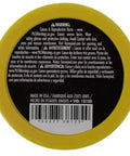 Back label of Ruby Fluid Soldering Flux Paste, 2-Ounce Jar, showing warning and product information in English and Spanish.