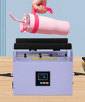 Heavy Duty 40 Oz Tumbler Heat Press Machine with Sturdy Iron Body and pink tumbler ready for sublimation.