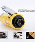 Close-up of Compact Air Die Grinder With One Quarter And One Eighth Collets for lubricating air inlet and operation.