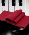 Red velvet anti-dust cloth on piano keys, part of 2 Pack 88 Key Piano Keyboard Dust Covers Red And Gray Velvet Anti Dust Cloths For Digital Electric Pianos Upright Grand Pianos Protectors Set Soft Velvet Shield To Keep Debris Off While You Play