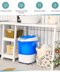 Compact Portable Washing Machine, 5 Point 5 Lb Mini Washer And Spinner Combo in a tidy laundry space with storage.