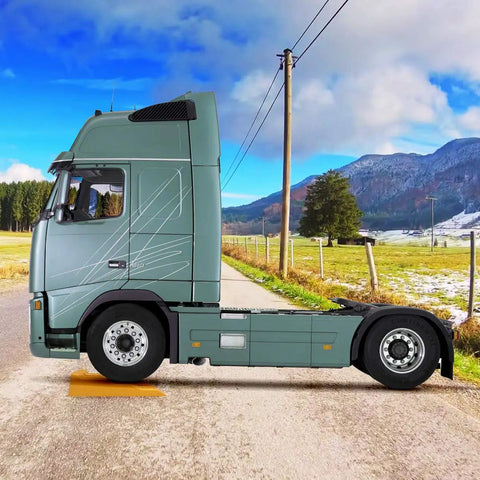 Truck on road using 4 Pack Leveling Ramps For Cars And SUVs Anti Slip Wheel Chocks And Levelers For Camper Trailer On Uneven Ground Heavy Duty Stabilizers To Lift And Stabilize Your Ride