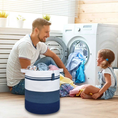 Oversized Cotton Rope Laundry Hamper Tall Stand Up Basket For Nursery Storage, shown in laundry room with dad and child.