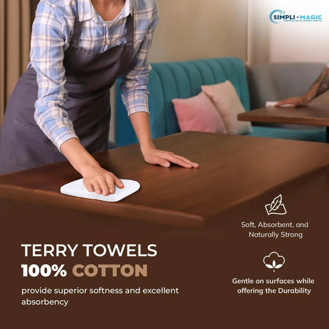 Person cleaning table with cotton terry towel, showcasing 60 Pack Cotton Terry Towels 14 By 17 Inches Highly Absorbent Cleaning Rags For Kitchen Bar And Restaurant Use Durable White Commercial Grade Ideal For Dishwashing Mopping And General Commercial Cleaning