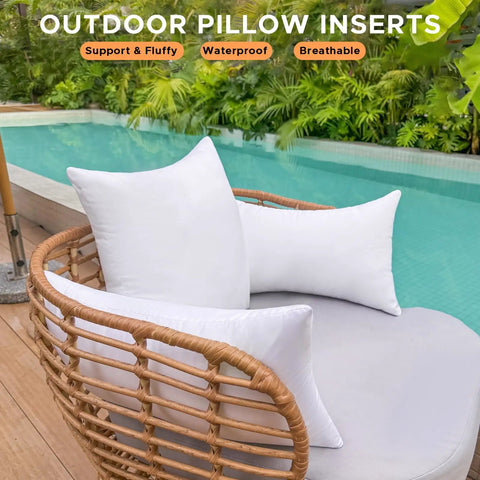 Set Of 2 12x20 Outdoor Pillow Inserts Waterproof For Patio Porch Couch And Outdoor Furniture White Rectangle Lumbar Throw Pillow Cushions Sofa Cushion Stuffers placed on wicker chair by pool