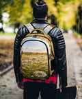 Dewy White Daisy Meadow Printed Unisex Backpack With Large Capacity For School And Travel on a person's back outdoors