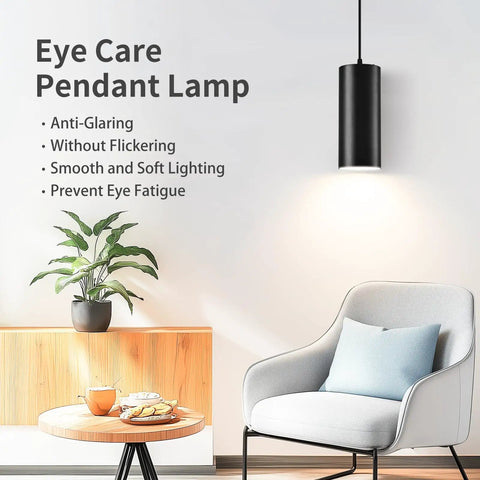 Sleek 4 Inch Led Pendant Lights, 25W Cylinder Hanging Fixtures With Dip Switch, Modern Eye Care Indoor Ceiling Lamps For Kitchen Island Flex Zone Or Home Office Setup In Matte Black 2 Pack above a cozy chair.
