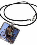 Straight Fire Penang Rickshaw Art Necklace features a dope rectangular pendant on a black rubber cord with a lobster clasp.