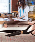 Dressmaker using Heavy Duty 8 Inch Fabric Scissors For Thick Materials And Leather, Pro Grade Sewing Shears, cutting fabric on table