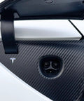 Premium Carbon Fiber Charge Port Wrap For Tesla Model 3 And Model Y featuring sleek textured surface on charging area.