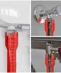 All In One 14 In 1 Sink Wrench Kit For Toilet Faucet And Kitchen Plumbing Installations And Repairs shown in use on pipes and valves