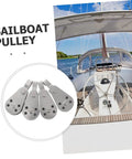Stainless Steel Marine Pulley Block Bundle For Kayak And Boat Deck Hardware Accessories, Cable Pulley Bearing Wheel displayed on sailboat