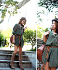 Braided Tassel Rope Belt For Women In PU Leather, Adjustable Tie Belt In Black And Brown, Long Elastic Belt With Tassels, Chic Everyday Accessory For Dresses, Jeans, And Coats. Woman wearing braided PU leather tassel belt over green dress