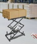 High Tech Electric Scissor Lift Table For Warehouse Pros, 180 Lb Heavy Duty Capacity with boxes elevated in warehouse setting.