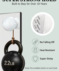 Close-up of a 2.2lb weight hanging from the 14 Bulb Vanity Lighting Kit For Makeup Mirror With Plug In Power Adapter And Touch Dimmer 6000K Cool White Up To 1350 Lumens CRI 90 Mirror Not Included.
