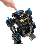 Child interacting with DC Super Friends RC Transforming Bat Bot 2-Foot Tall Robot With Lights And Sounds Remote Control For Pretend Play, showing details of head design and control panel.