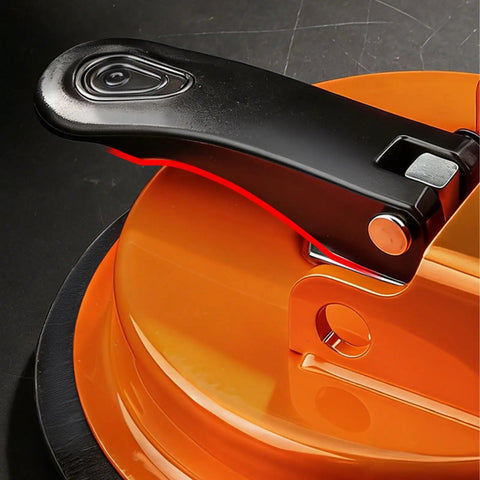 Close-up of Floor Gap Fixer Tool For Laminate, Vinyl, Wood And Tile Floors - Adjustable Quick Lock And Release Repair Tool, Bright Orange