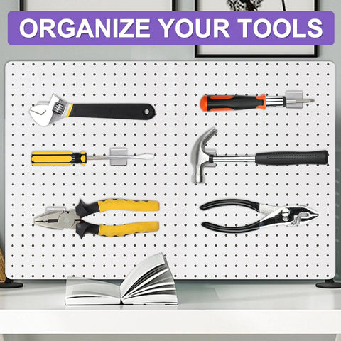 Front view of pegboard tool organizer with assorted hand tools mounted (wrench, screwdriver, knife, pliers, hammer).