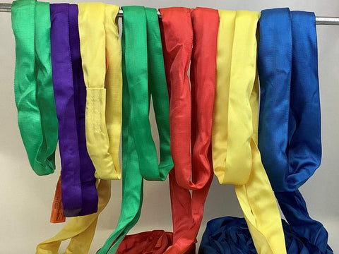 Multi-colored hoisting slings, including Green Poly 6 Foot Endless Round Sling Workhorse With 5300 Lbs Vertical WLL And 10600 Lbs Basket WLL.