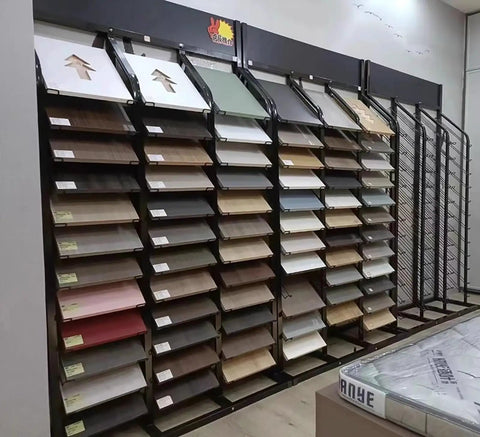 Heavy Duty Floor Tile Display Rack And Sample Organizer Shelf, sturdy iron display holding various tile samples in showroom.