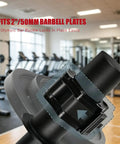 Close-up of Multi Functional Game Changing Wrist Strength Trainer For 2 Inch Olympic Plates in a gym setting