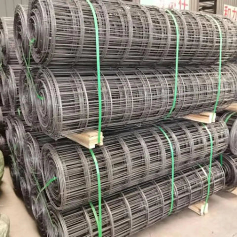 Rolls of welded wire mesh panels produced by Fully Automatic Wire Mesh Welding Machine For Construction Wirecloth, ready for construction use.