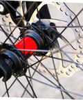 Radical Performance Mechanical Disc Brake Set For Mountain Bikes Front And Rear 160Mm Rotors close-up of red hub and rotor.