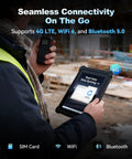 Person holding Built Like A Tank 10.1 Inch Rugged Tablet PC With Windows 11 Pro and Intel Core I5 in construction site.