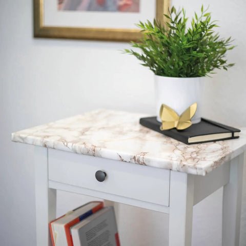 Brown Marble Self Adhesive Film For Walls And Furniture Peel And Stick Decorative Vinyl Wrap installed on a table top