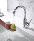 Compact Chrome Bar Faucet With Single Hole Design, One Handle Control For Hot And Cold Water, shown in stainless steel sink