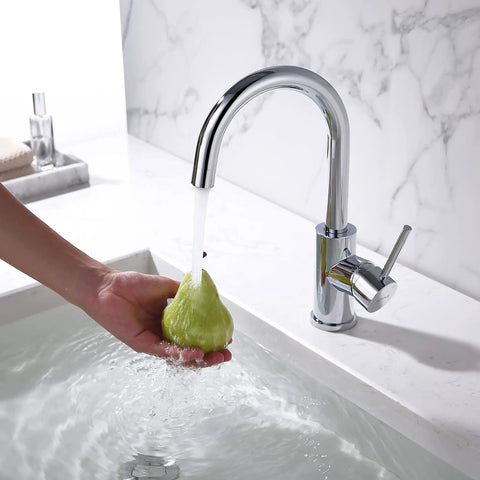 Compact Chrome Bar Faucet With Single Hole Design, One Handle Control For Hot And Cold Water, shown in stainless steel sink