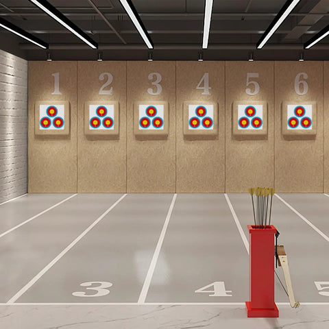Indoor range with 3 Spot Archery Target Paper Set with Pins on numbered stands, New LAS Version, for practice or training.